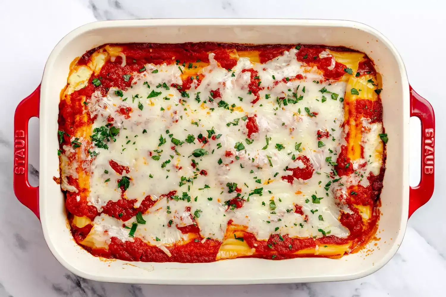 Deliciosos manicotti de queso al horno con salsa marinara