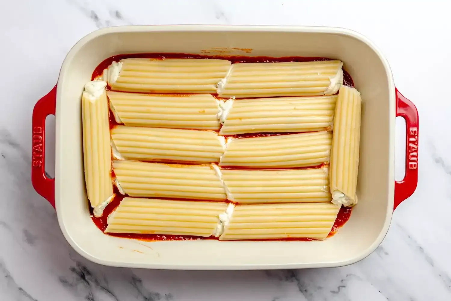 Deliciosos manicotti de queso al horno con salsa marinara