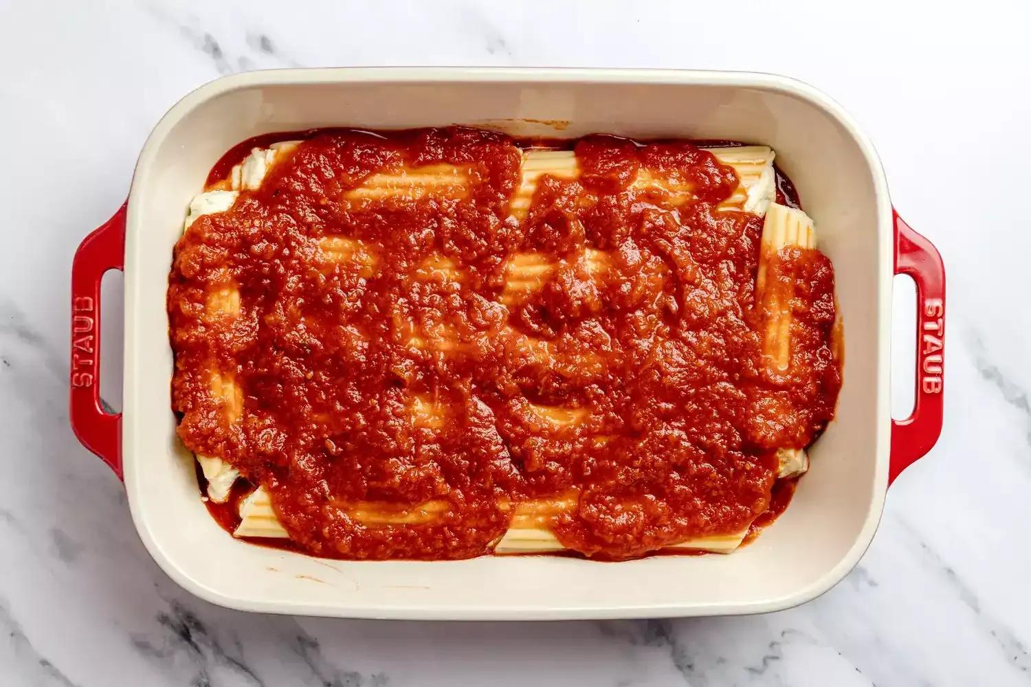 Deliciosos manicotti de queso al horno con salsa marinara