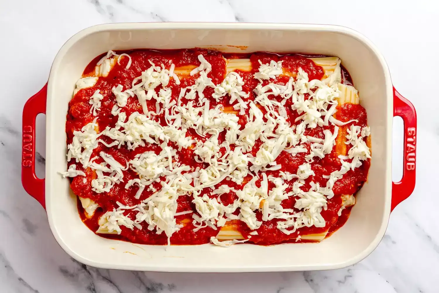 Deliciosos manicotti de queso al horno con salsa marinara